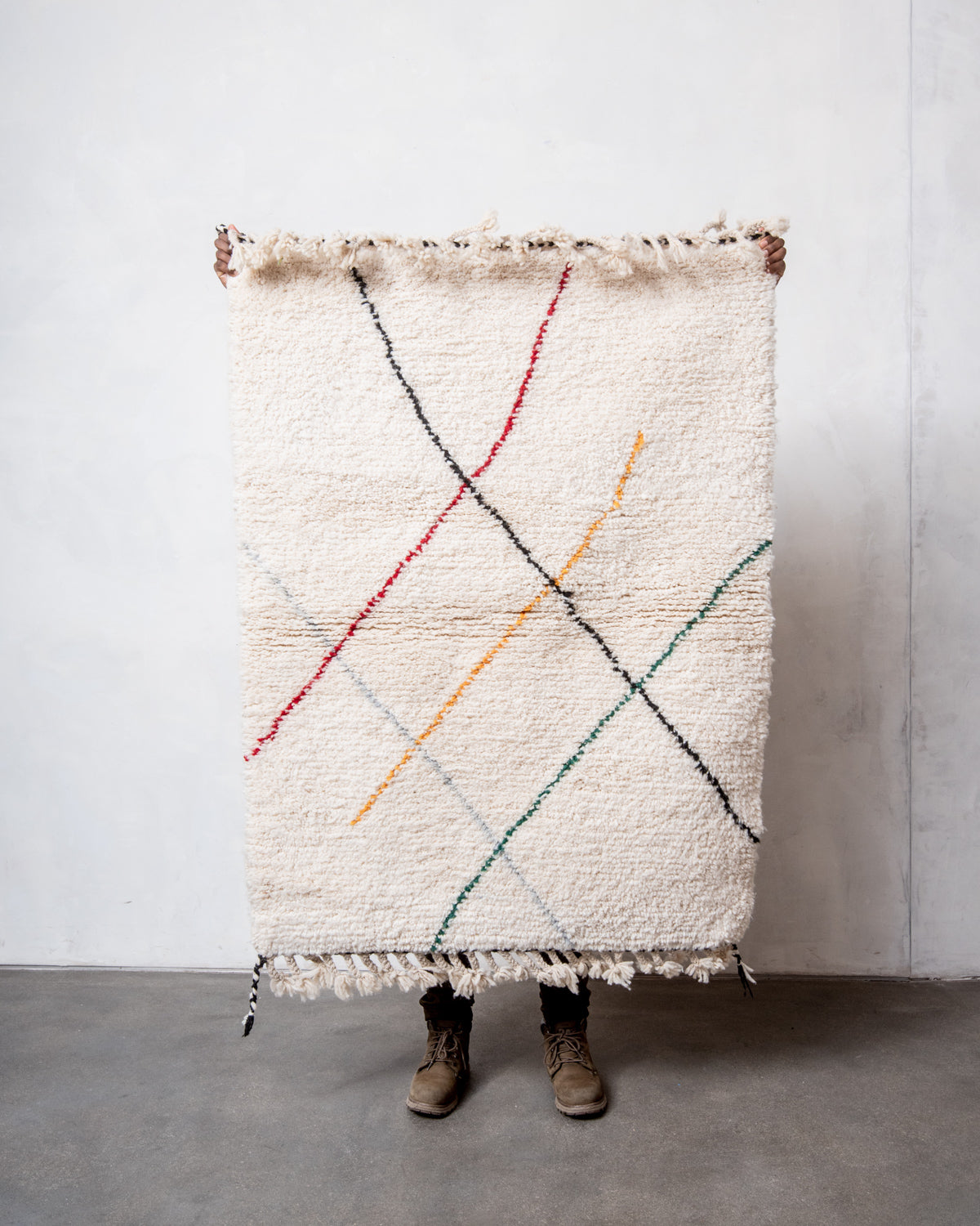 Modern, designer, handcrafted Berber rug from Morocco. Beniourain carpet with beautiful colours and patterns and fluffy wool texture.